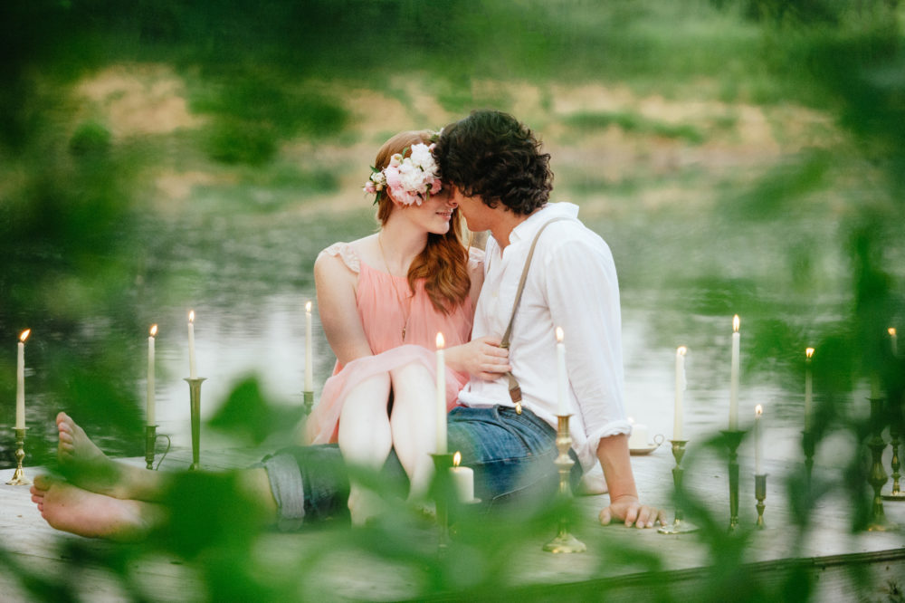 Vintage floral candlelight engagement session on the water.