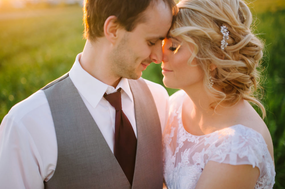 Sunset wedding photos taken by Stephanie Marie Photography in North Liberty, Iowa at South Slope Cooperative