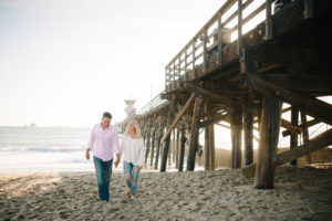 Los Angeles and San Diego engagement session with magazine model couple in Seal Beach at the Pier.