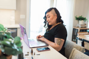 Women small business owner on computer branding photography