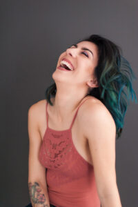 Lindsay makeup artist in relaxed and cheerful headshot and branding session